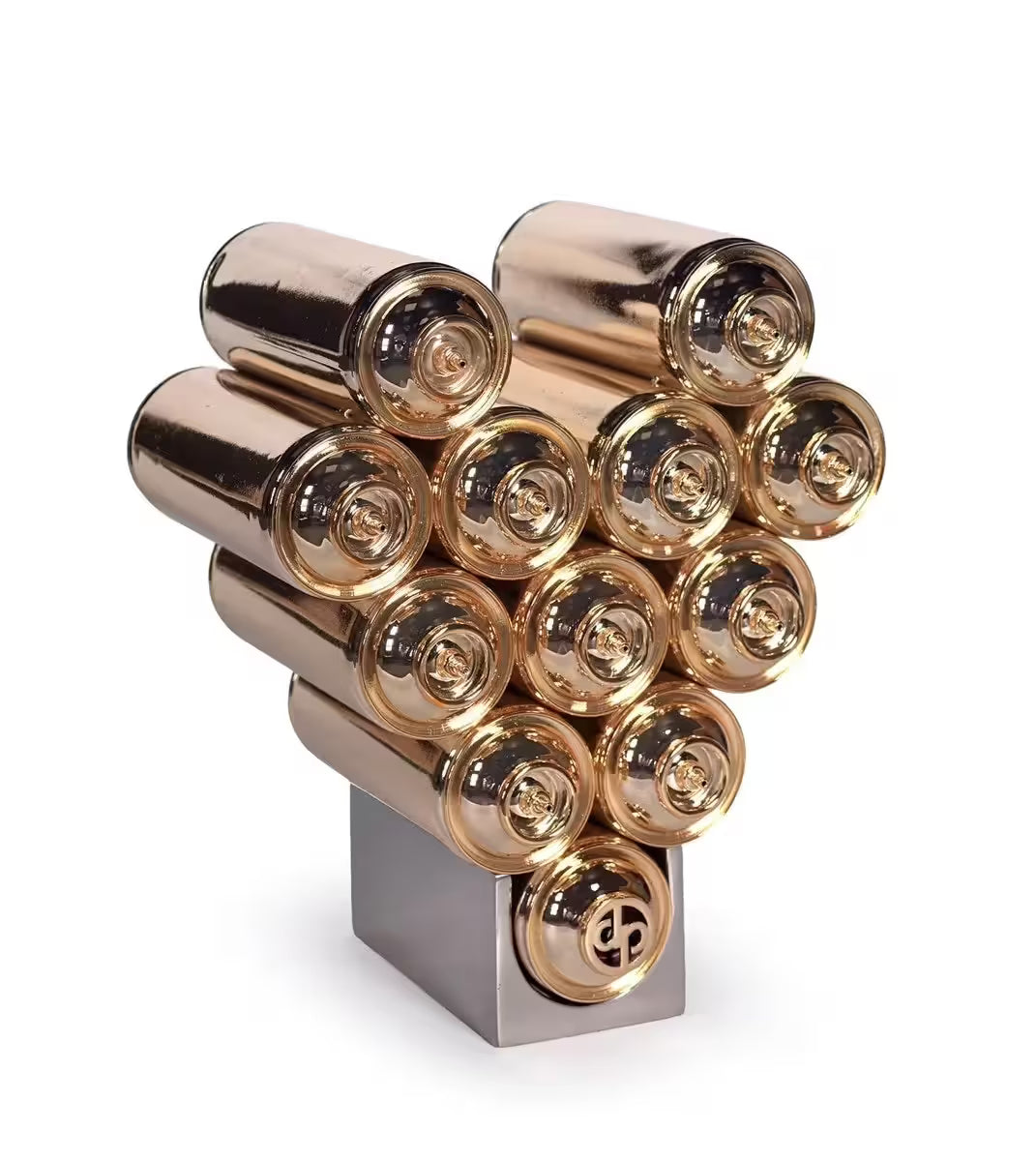 A Dan Pearce limited edition sculpture of spray cans made up to make a heart, the title is Sprayed With Love Gold