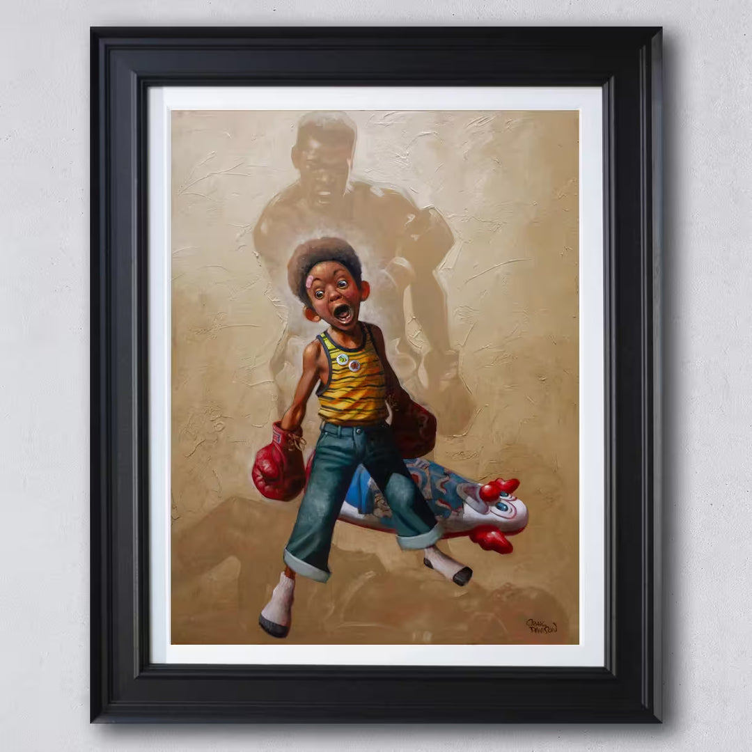 A Craig Davison limited edition of a young boy with boxing gloves on and has knocked down a n inflatable clown, the title is Sting Like a Bee