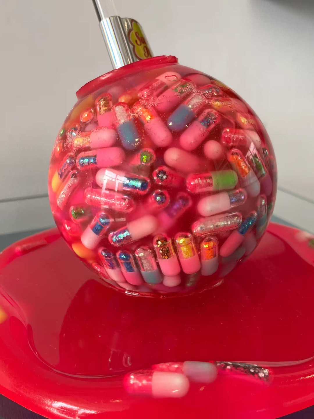 An Emma Gibbons original mixed media sculpture, the title is Suck It and See