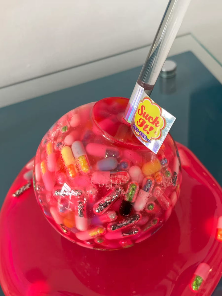 An Emma Gibbons original mixed media sculpture, the title is Suck It and See