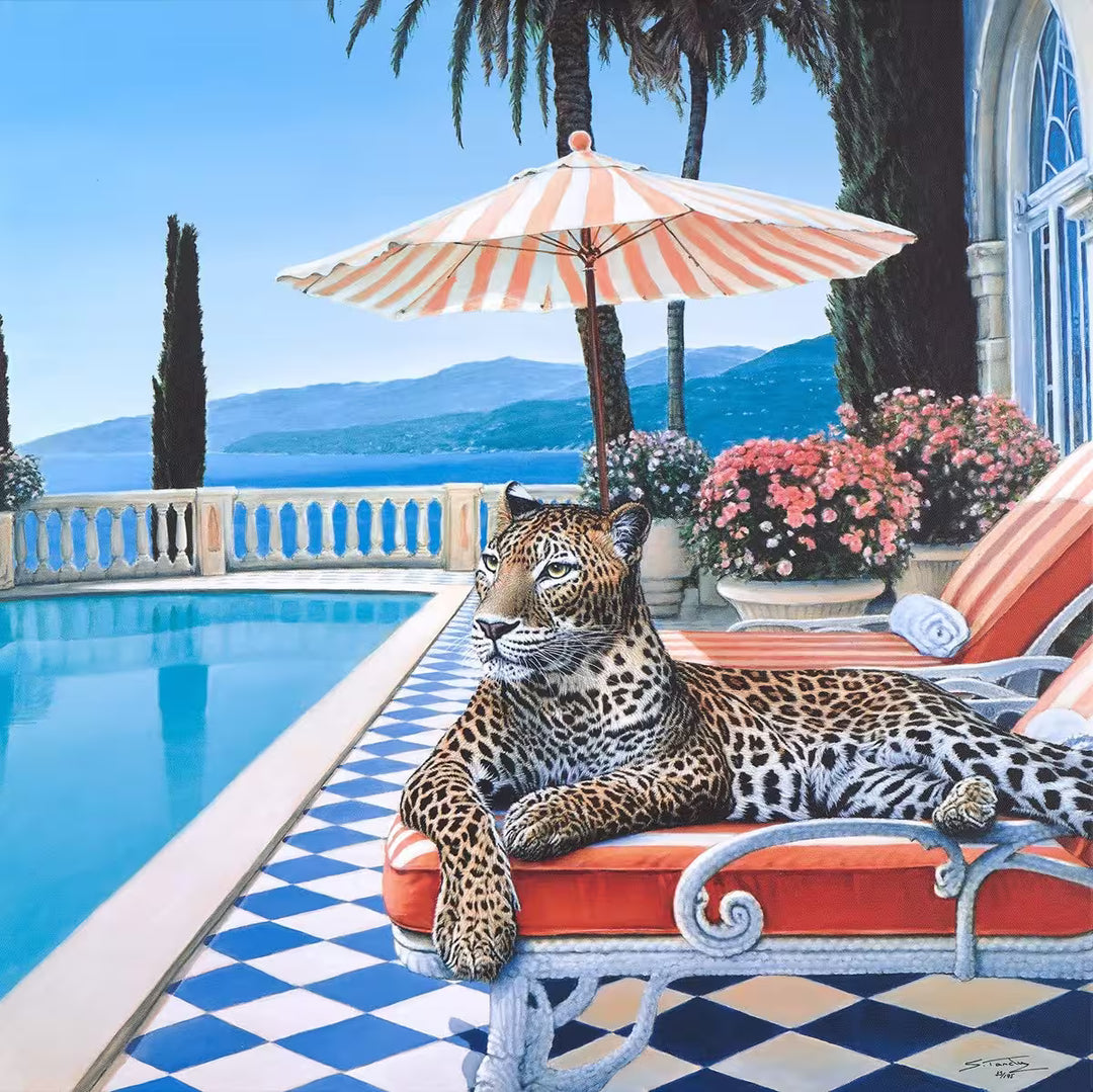 A Steve Tandy limited edition of a leopard laying on a sun bed b a sunny poolside, the title is Summer in Sorrento