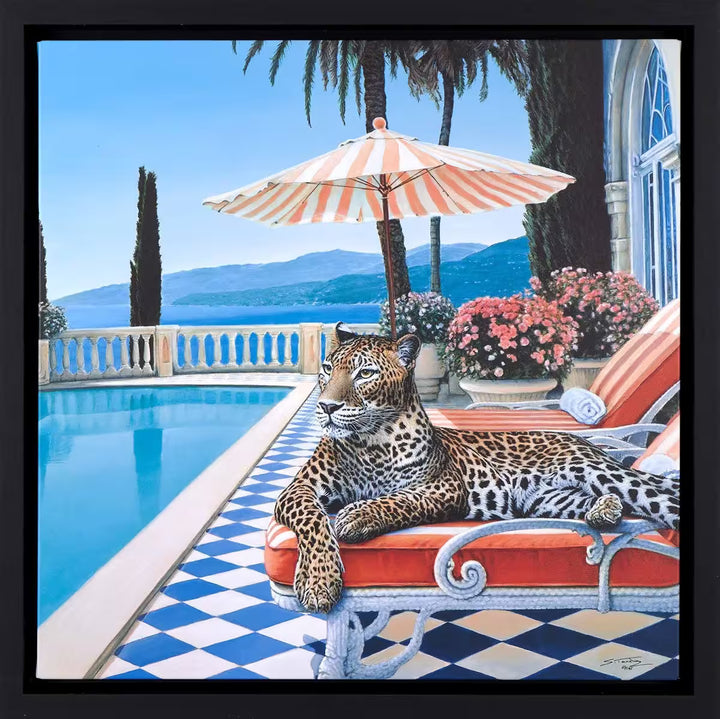 A Steve Tandy limited edition of a leopard laying on a sun bed b a sunny poolside, the title is Summer in Sorrento