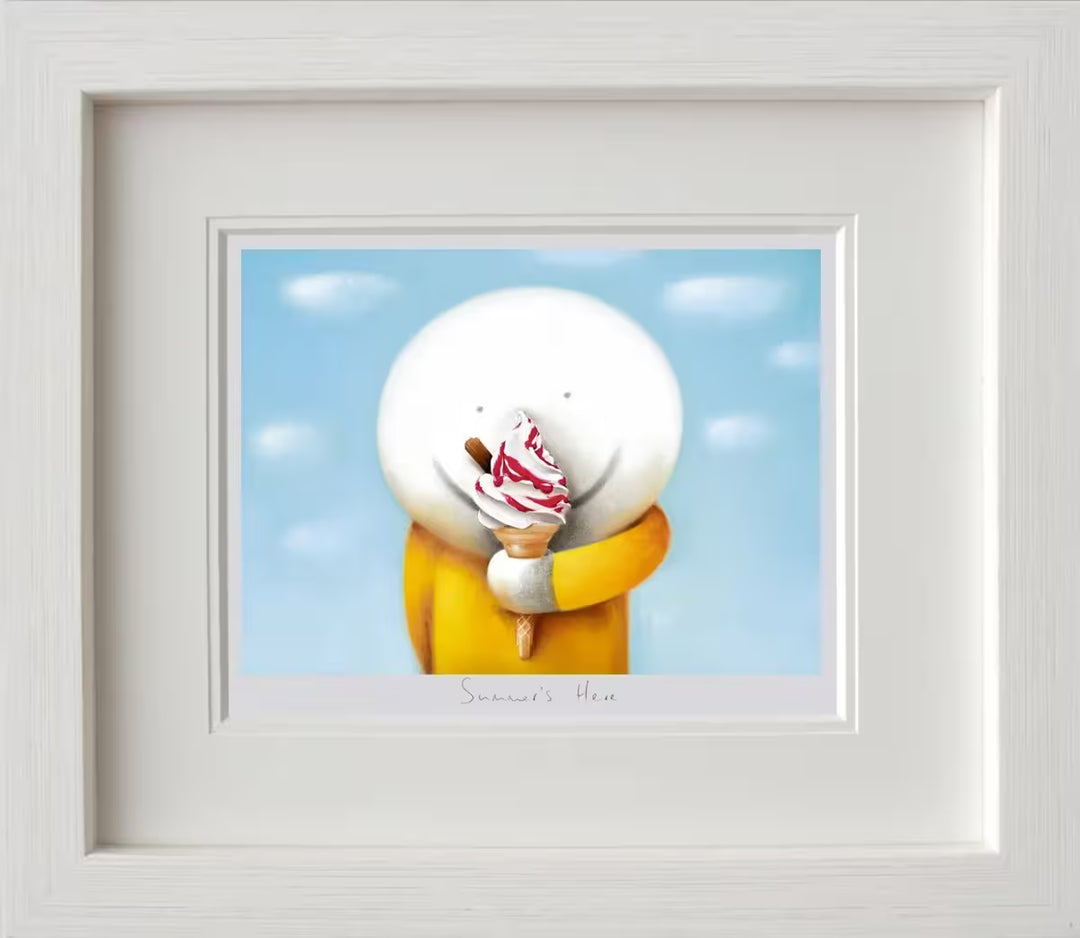 A Doug Hyde framed limited edition print of a person in yellow holding an ice cream with sauce and a flake in it in front of a blue sky, the title is Summers Here