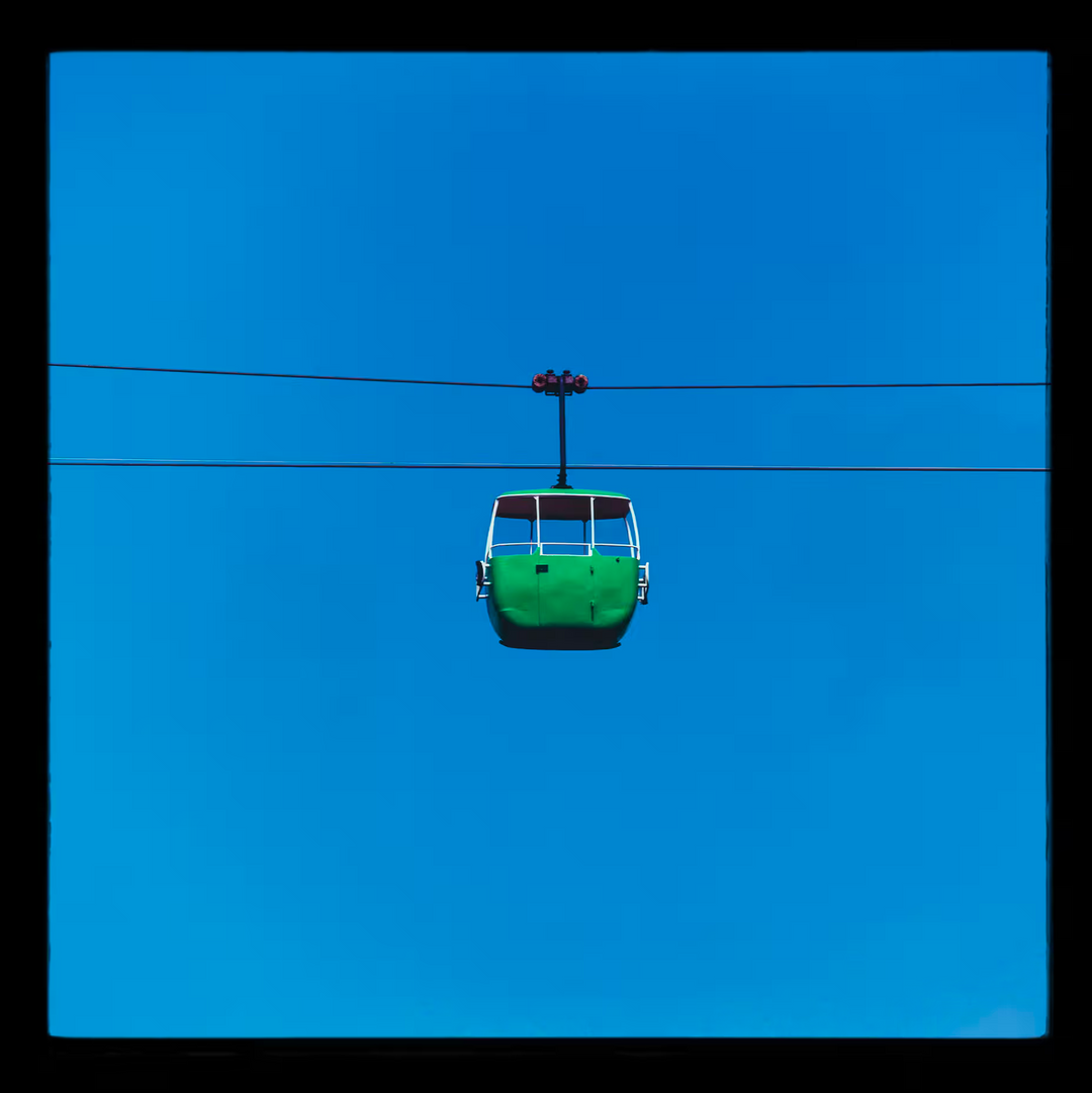 A Richard Heeps limited edition photographic print of a Yellow cable car, the title is Summit Cable Car Green, Great Orme, Llandudno, 2023