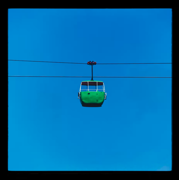 A Richard Heeps limited edition photographic print of a Yellow cable car, the title is Summit Cable Car Green, Great Orme, Llandudno, 2023