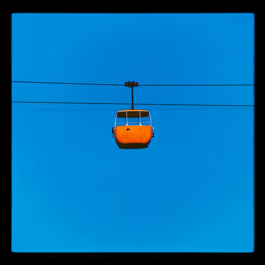 A Richard Heeps limited edition photographic print of a Yellow cable car, the title is Summit Cable Car Orange, Great Orme, Llandudno, 2023
