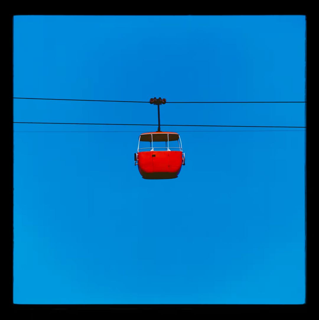 A Richard Heeps limited edition photographic print of a Yellow cable car, the title is Summit Cable Car Red, Great Orme, Llandudno, 2023