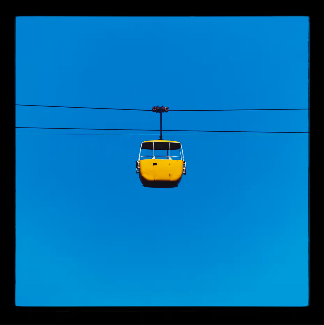 A Richard Heeps limited edition photographic print of a Yellow cable car, the title is Summit Cable Car Yellow, Great Orme, Llandudno, 2023