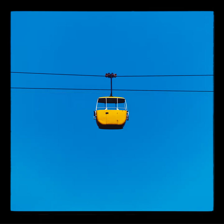 A Richard Heeps limited edition photographic print of a Yellow cable car, the title is Summit Cable Car Yellow, Great Orme, Llandudno, 2023