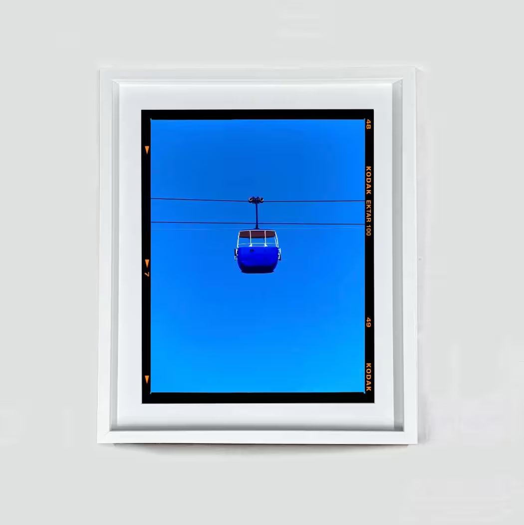 A Richard Heeps limited edition photographic print, the title is Summit Cable Car (Blue), Great Orme, Llandudno, 2023