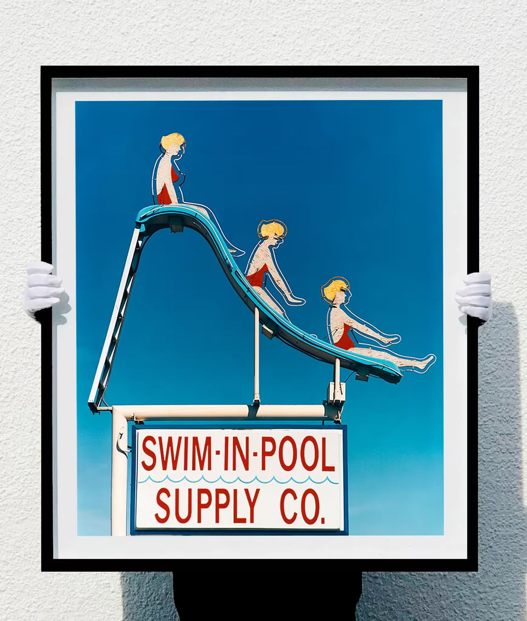 Richard Heeps holding Swim-in-Pool Supply Co. Las Vegas, 2003