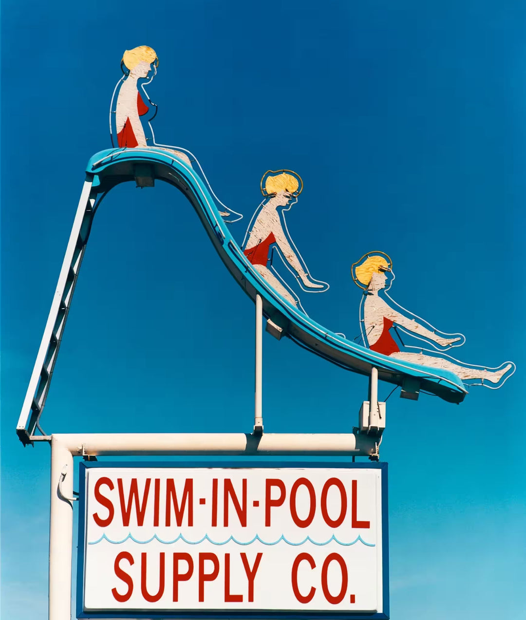 A limited edition photograph by Richard Heeps using vibrant colours, the title is Swim-in-Pool Supply Co. Las Vegas, 2003