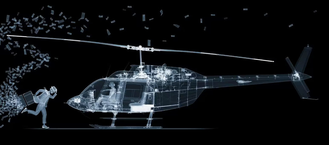 A limited edition Chromaluxe print by Nick Veasey of an X-Rayed helicopter that is taking off with a skelton running towards it with a bag full of money that is blowing away, the title is The Fly Away