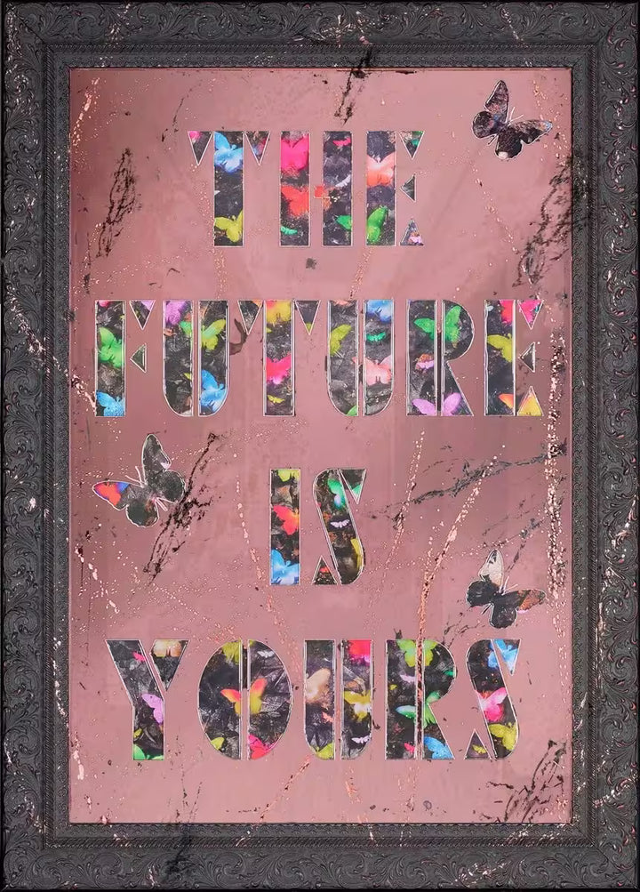 A Maxim limited edition of a reflective base with butterflies and writing over the top, the title is The Future Is Yours