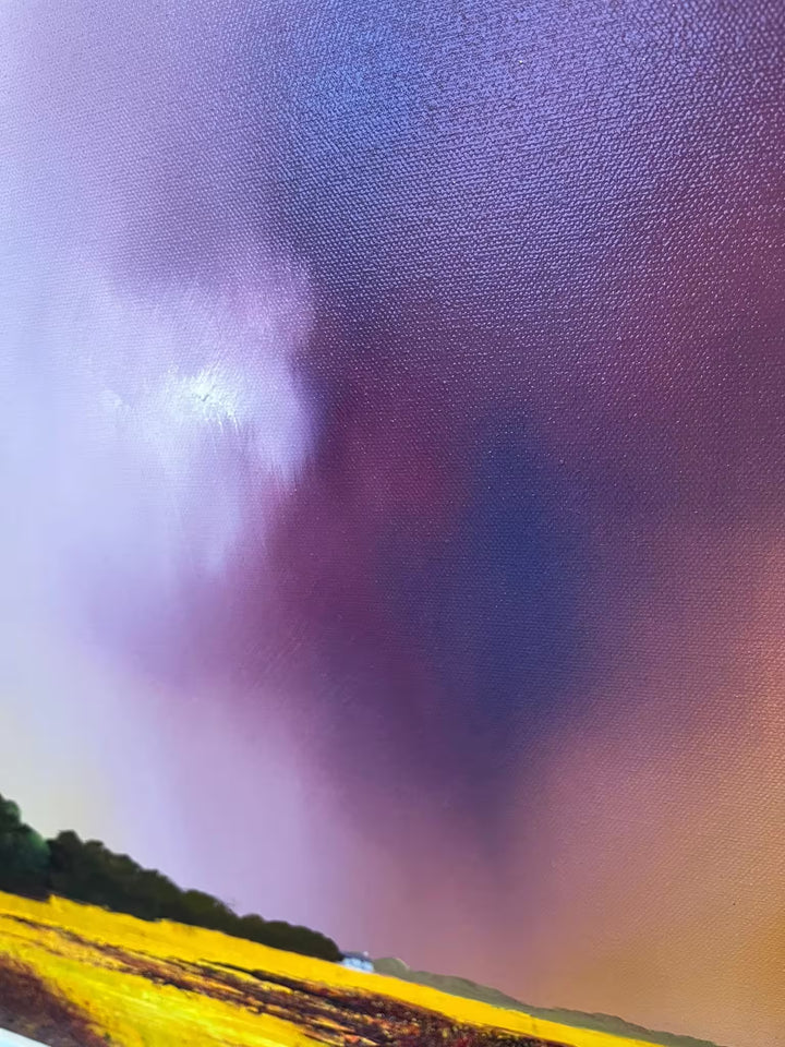 A Barry Hilton original of a yellow field and purple stormy sky, the title is The Keeper of Silence