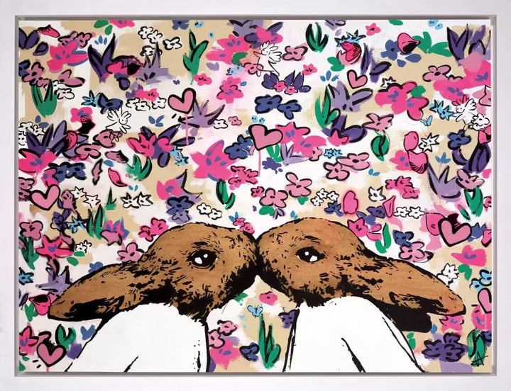 A Harry Bunce limited edition piece of two bunnies kissing in a field of flowers and bunny angels, the title is The Kiss