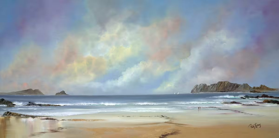 A Philip Gray original of a pastel sky over a beach with two people walking, the title is The Quiet Coast