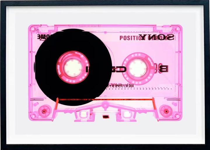 A framed limited edition photograph by Richard Heeps using vibrant colours, the title is Tape Collection Type II Pink