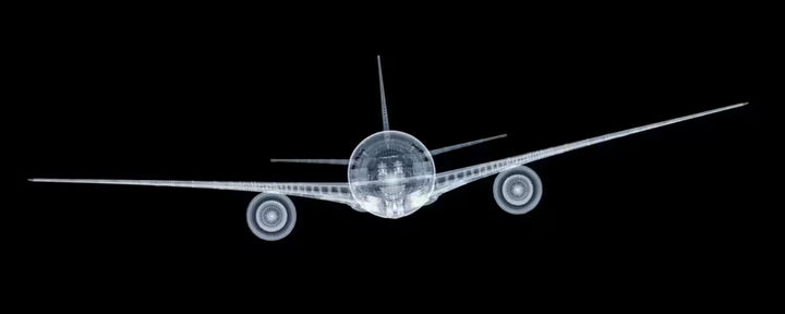 A limited edition Chromaluxe print by Nick Veasey of an X-Rayed aeroplane, the title is Veasey Jet
