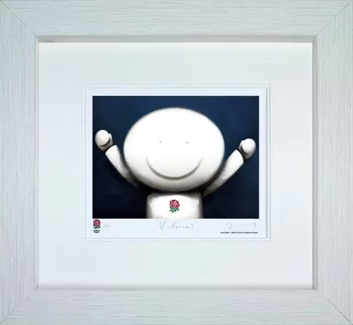 A Doug Hyde limited edition print of a Rugby player celebrating, framed, title is Victorious 