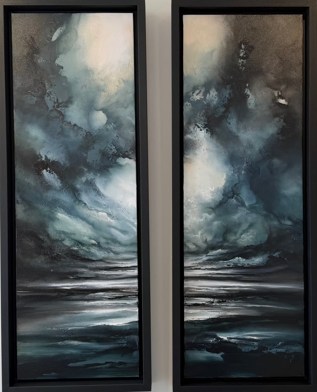 A Simon Kenny original diptych of a dark and stormy sky, the title is Winter I &amp; II (Diptych)