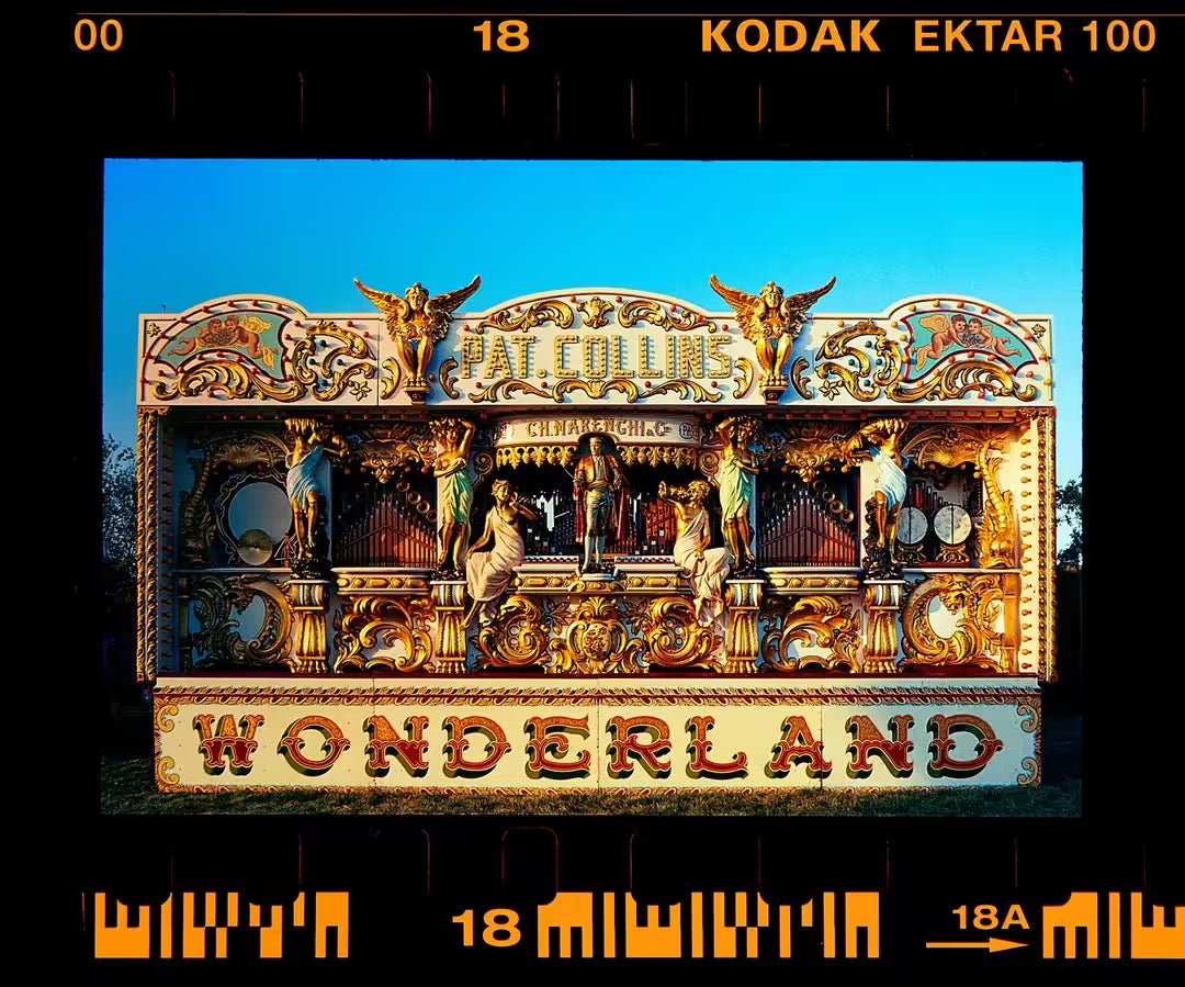 A limited edition photograph by Richard Heeps using vibrant colours, the title is Wonderland (Day), Haddenham Steam Rally, Cambridgeshire, 2019