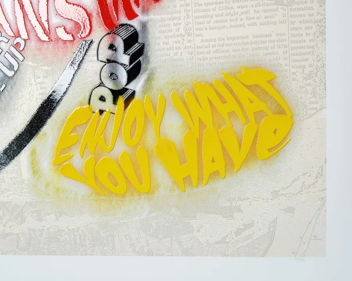 A close up of Mr Brainwash Written in Love