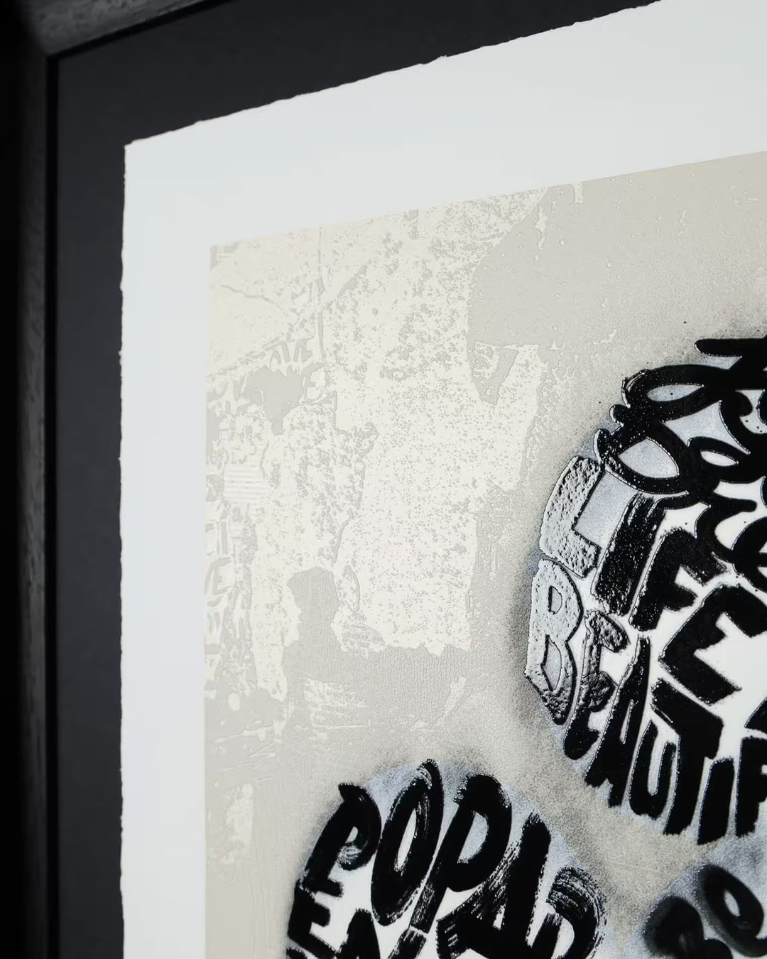 A close up of Mr Brainwash Written in Love