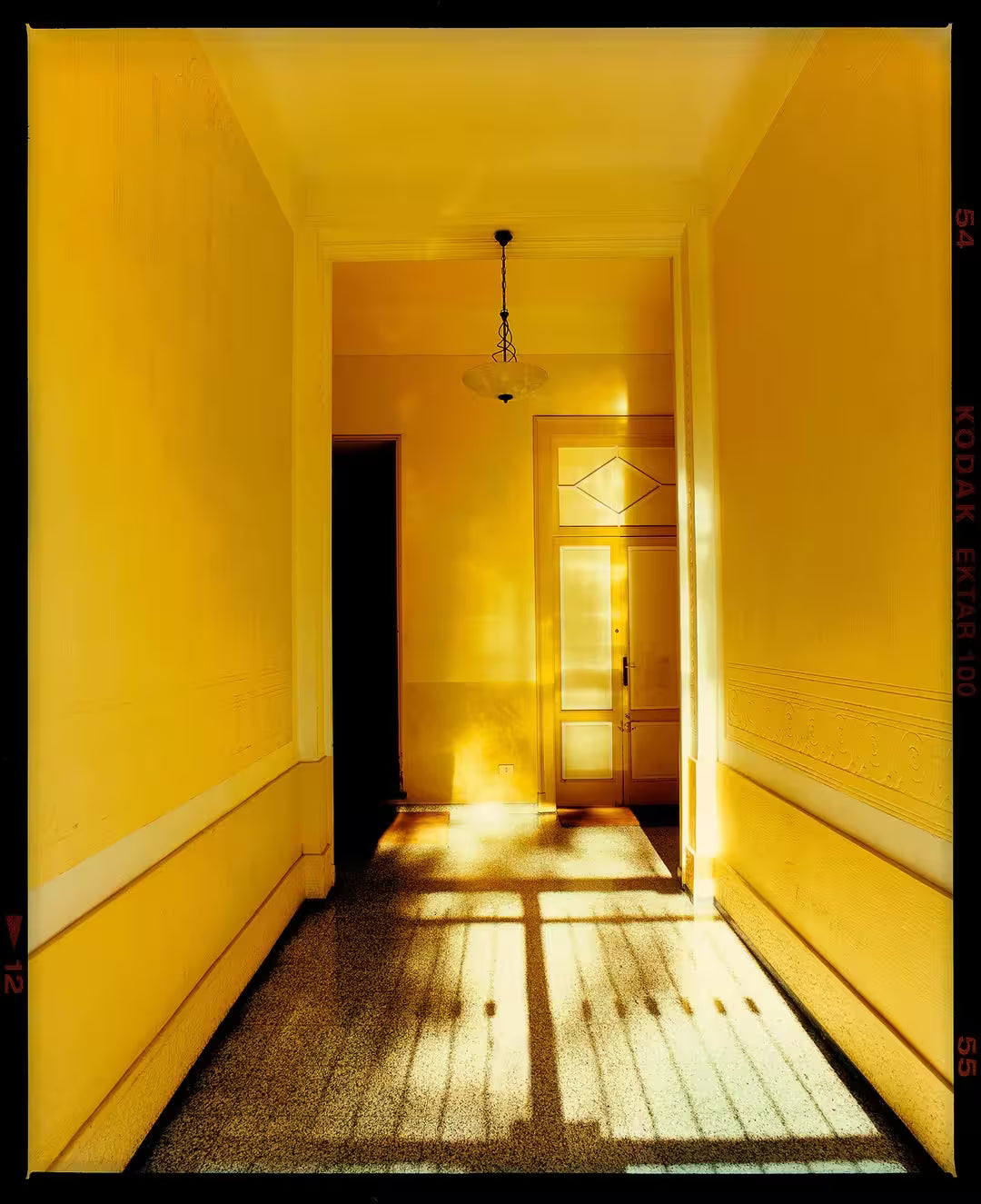 A limited edition photograph by Richard Heeps using vibrant colours, the title is Yellow Corridor Day, Milan, 2019