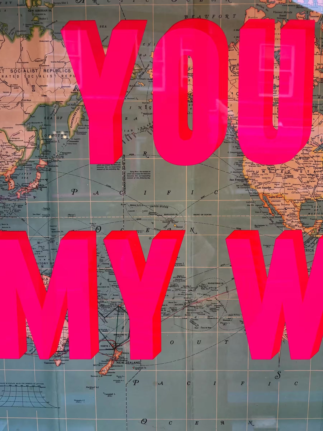 A limited edition piece by The Real Hackney Dave of a map with pink screenprint on top, the title is You Are My World