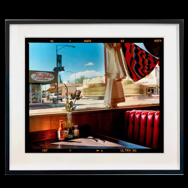 A framed limited edition photograph by Richard Heeps using vibrant colours, the title is Bonzanza Cafe (6x7 Film Rebate), Lone Pine, California, 2001 
