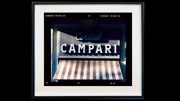 A framed limited edition photograph by Richard Heeps using vibrant colours, the title is Cordial Campari