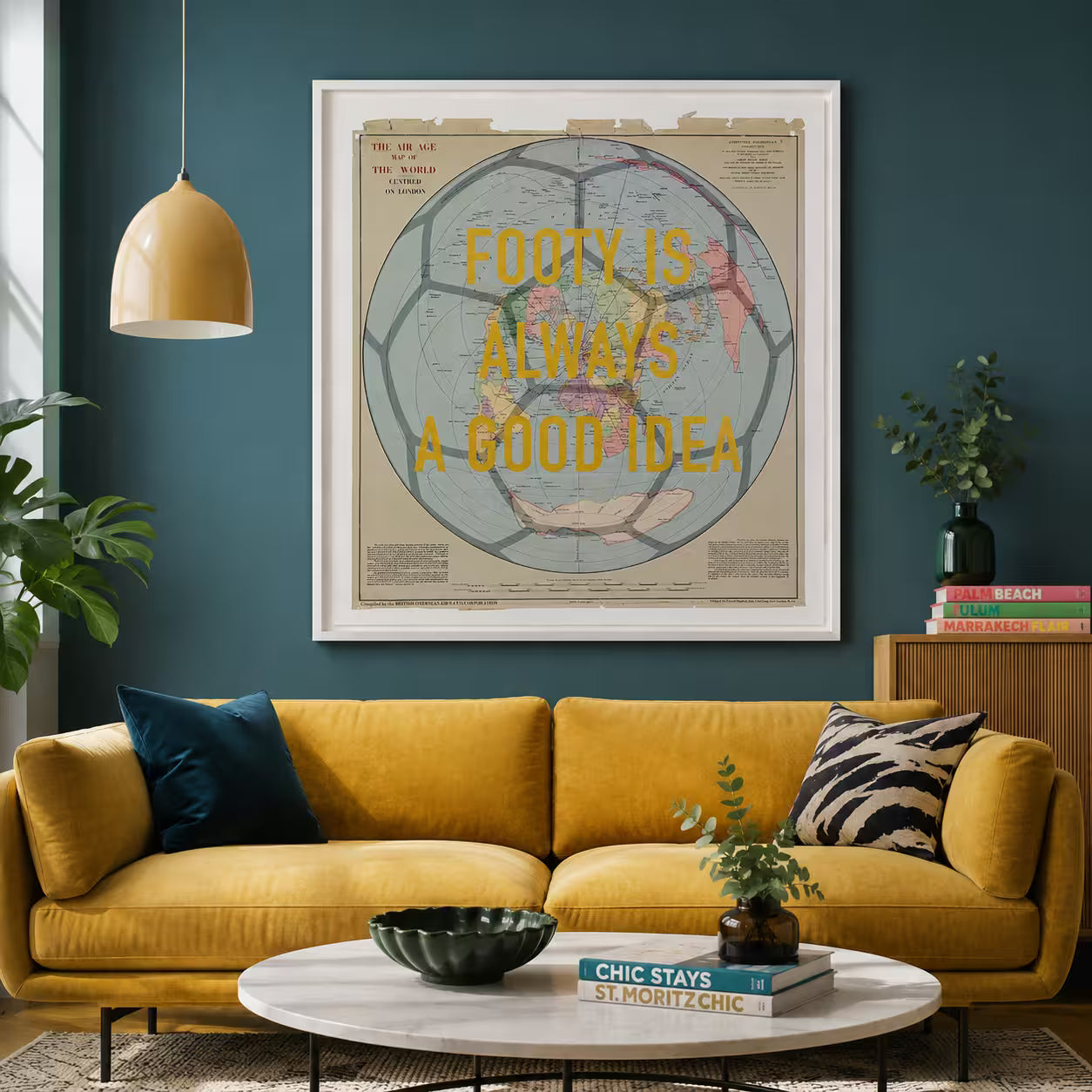 Living room with yellow sofa, coffee table, and framed map art on the wall.