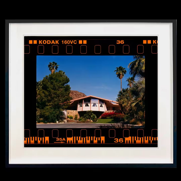 A framed limited edition photograph by Richard Heeps using vibrant colours, the title is On the Road Honeymoon Hideaway, Palm Springs, California, 2000