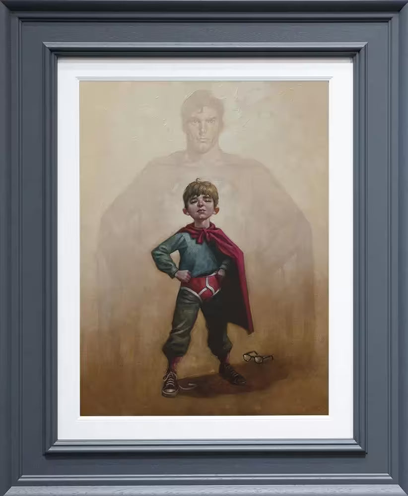 A Craig Davison limited edition of a boy stood with a cape and underwear with a pair of glasses on the floor and superman behind him, the title is Lad of Steel