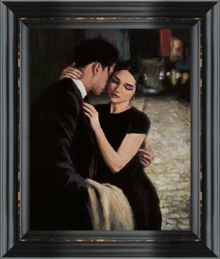 A Fabian Perez framed limited edition piece of a man and woman holding one another, the title is Love in The City