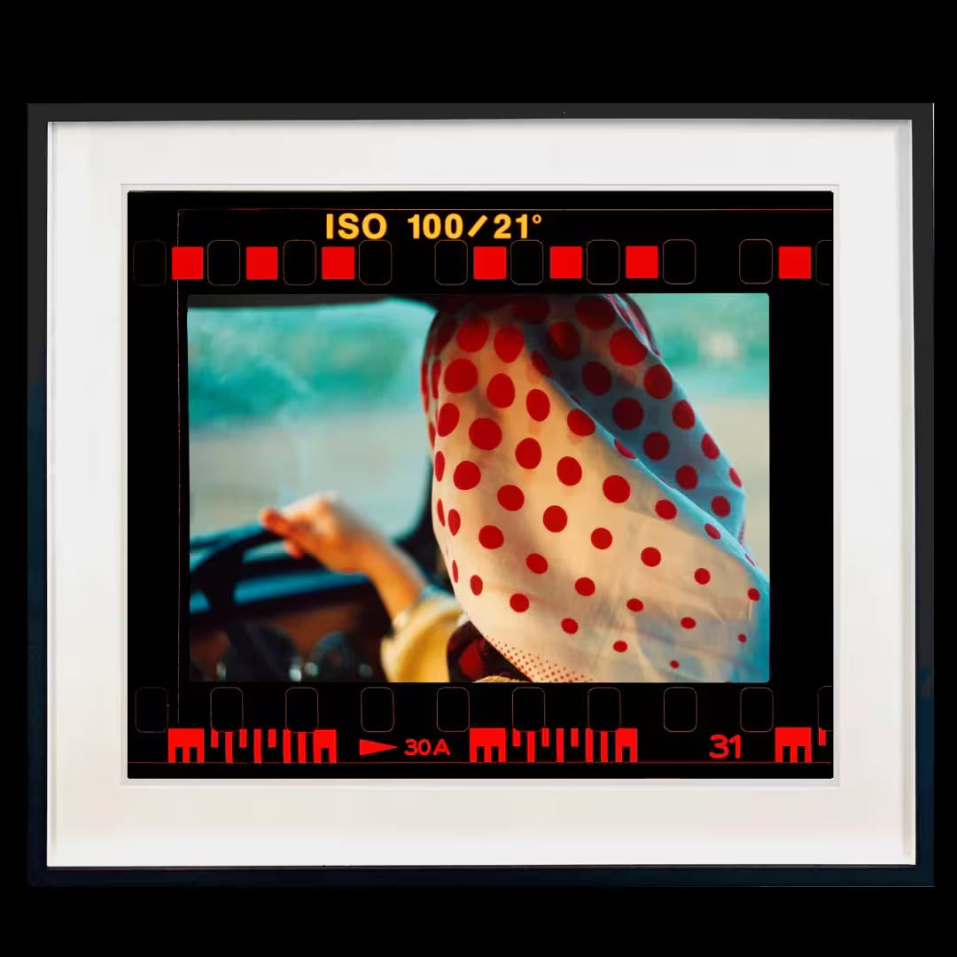 A framed limited edition photograph by Richard Heeps using vibrant colours, the title is On the Road Anita, Lady Fen, Welney, 1993