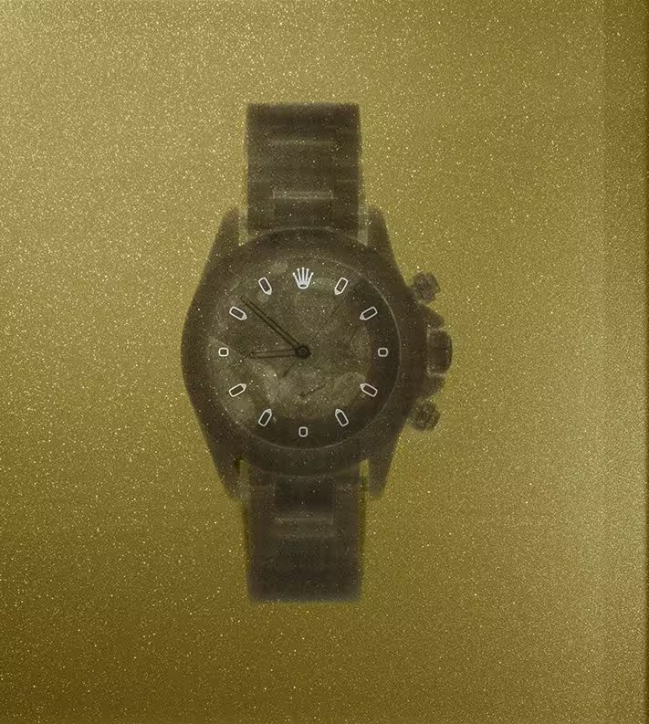 A limited edition Chromaluxe print by Nick Veasey of an X-Rayed Rolex Watch, the title is Gold rolex Daytona